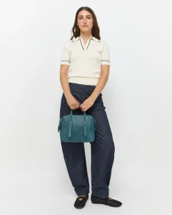 Bolso bandolera con asa de mano