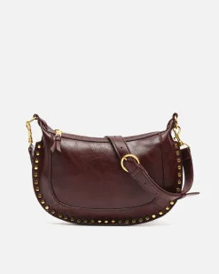 Bolso bandolera pequeño con detalles metálicos