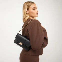 Bolso bandolera pequeño con solapa y correas extraíbles